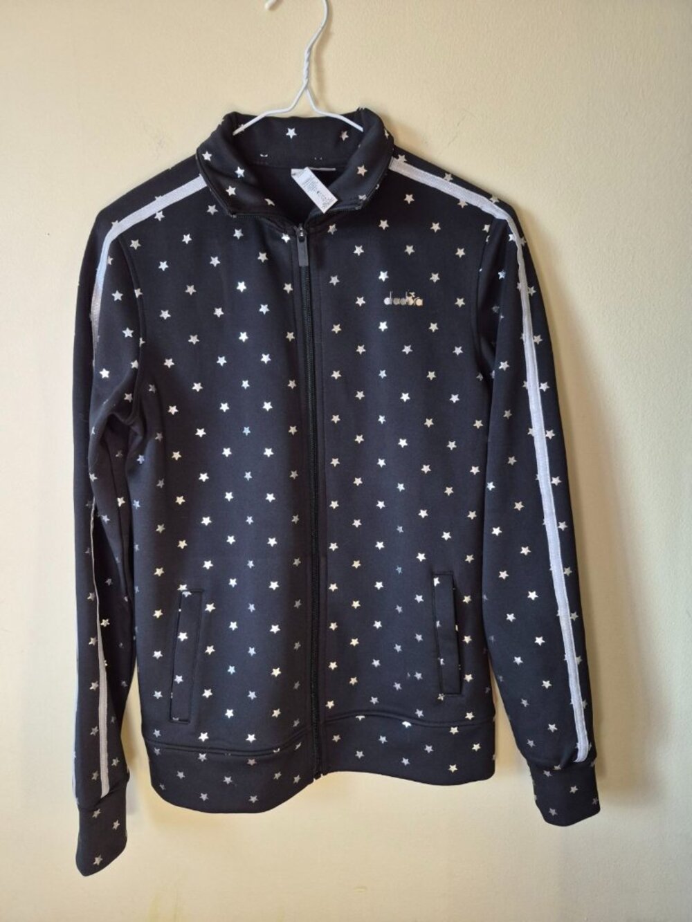 Women's sports jacket with stars from the brand Diadora size L